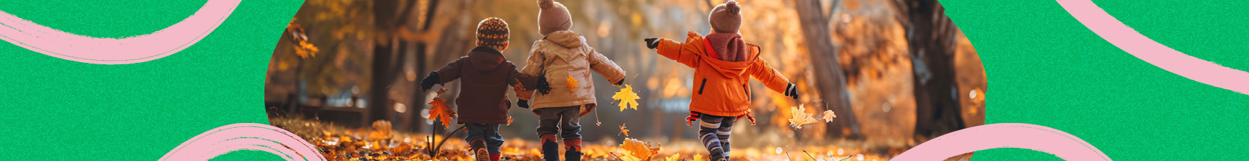 Three kids frolicking in a wooded area, linking arms and tossing autumn foliage into the air