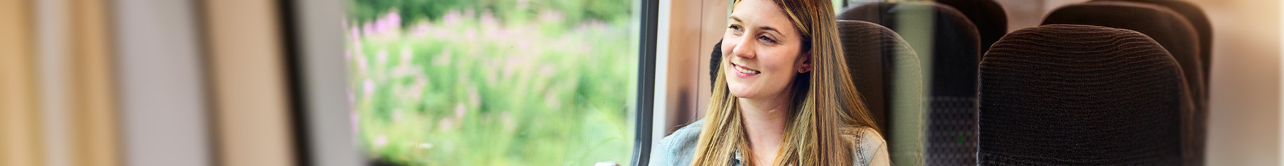 Passenger looking out the train window