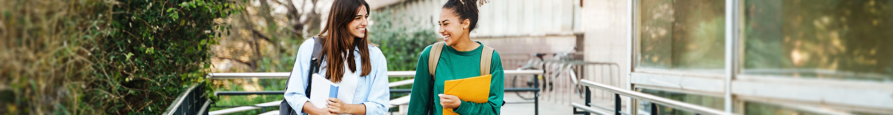 Two students walking to university