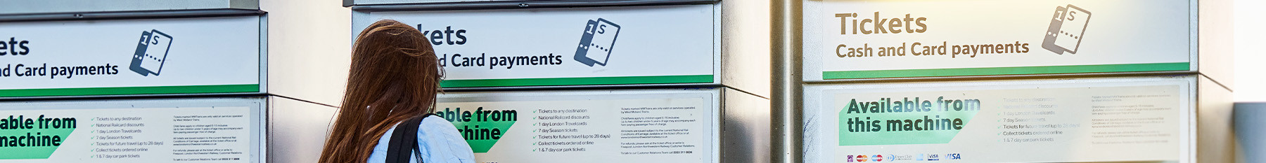 Passesnger using a ticket vending machine