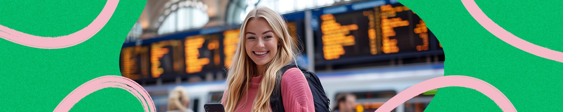 A young woman at a train station on mobile phone in front of departures board