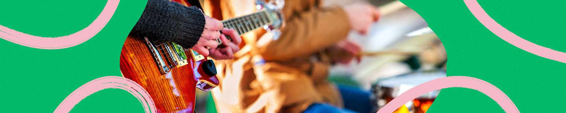 two people playing guitar and drums