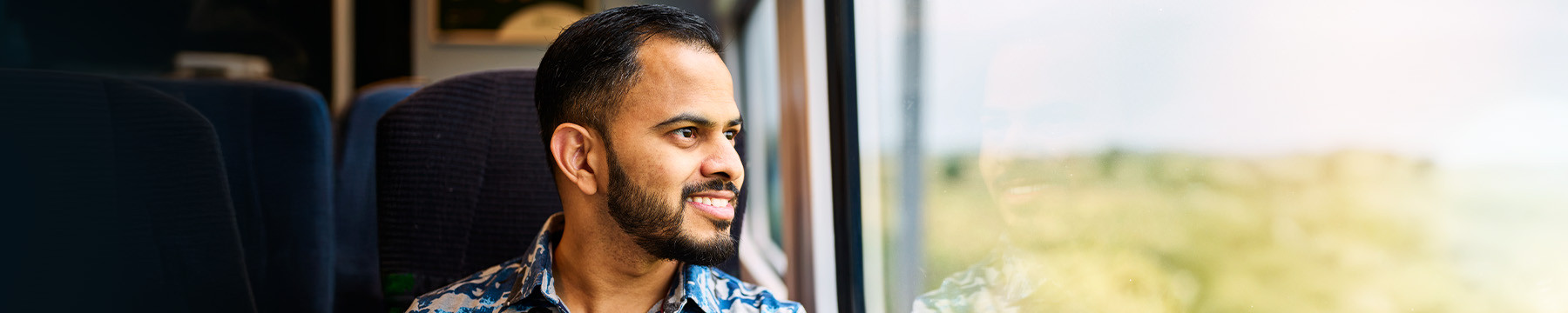 Passenger looking out the train window