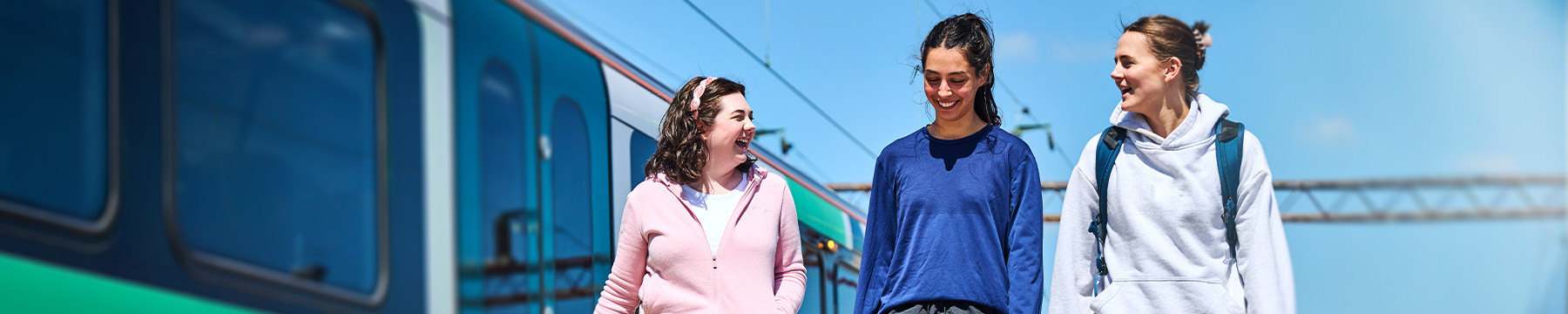 Students walking on train platform