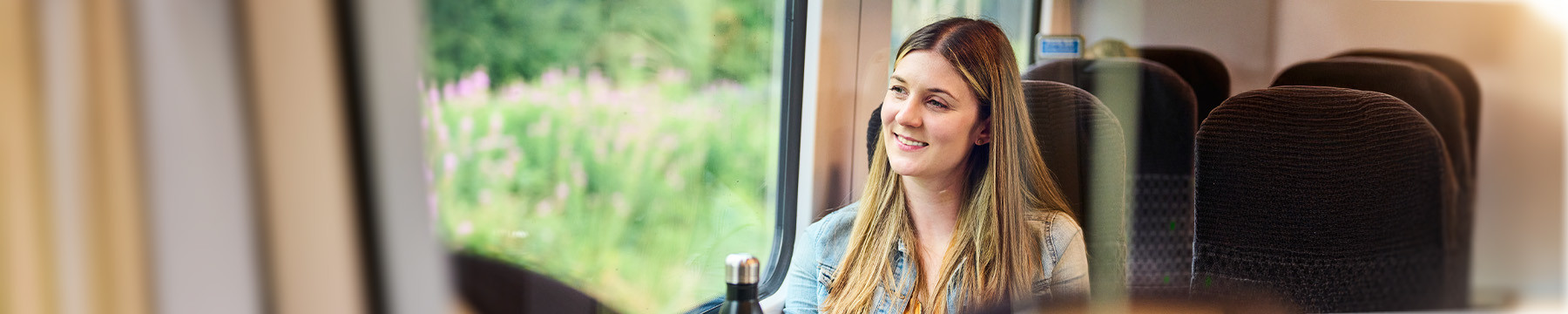 Passenger looking out the train window