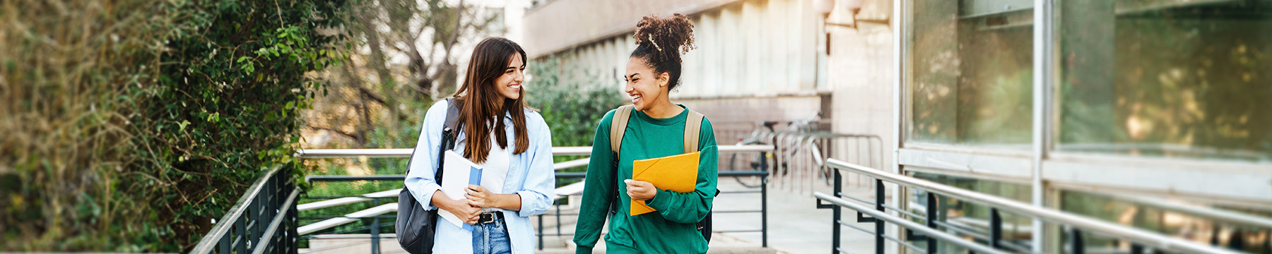 Two students walking to university