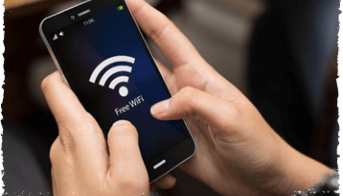 Passenger using free Wi-Fi on the train