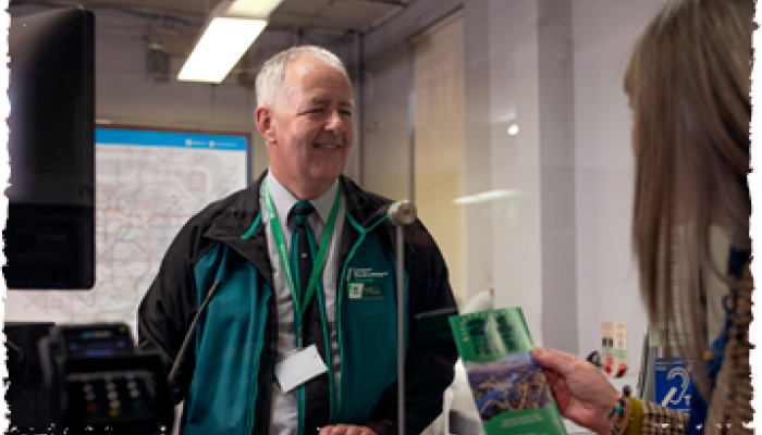 Man in ticket office
