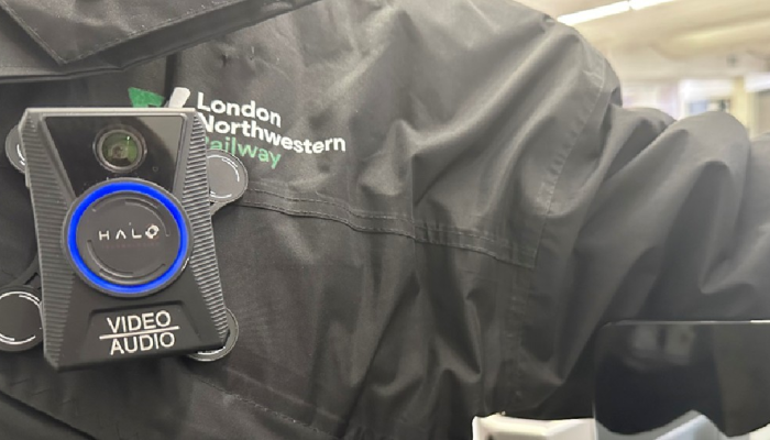 An image of a LNR colleague wearing a Body Worn Camera on a black jacket with the LNR logo 