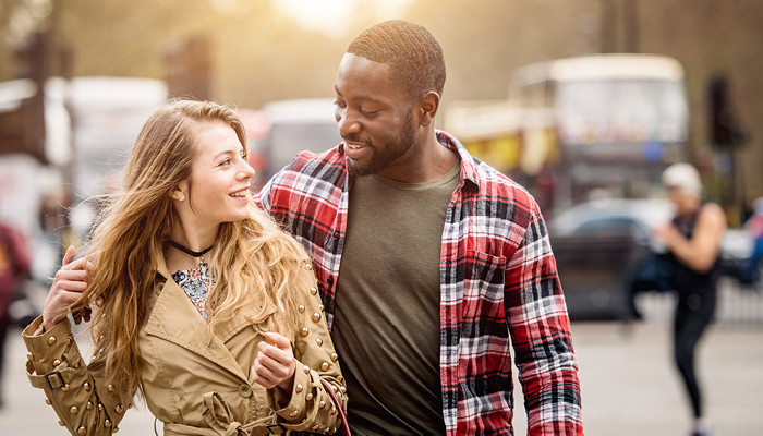 couple walking through the city
