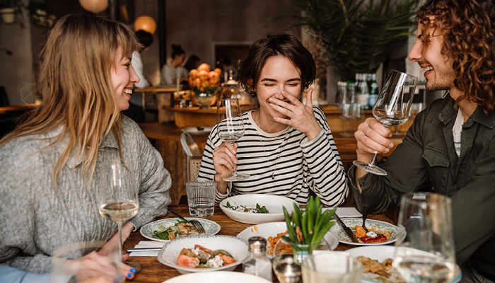 people enjoying food and drink together