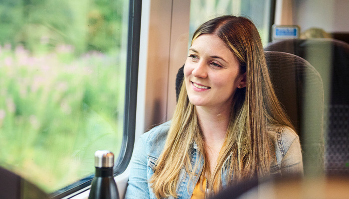 Passenger looking out the train window