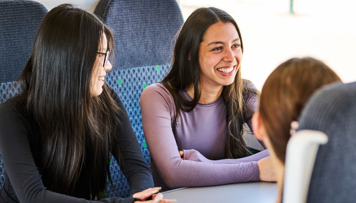 Students sat on London Northwestern train