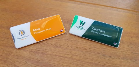 Railway staff recognised for language skills with custom name badges