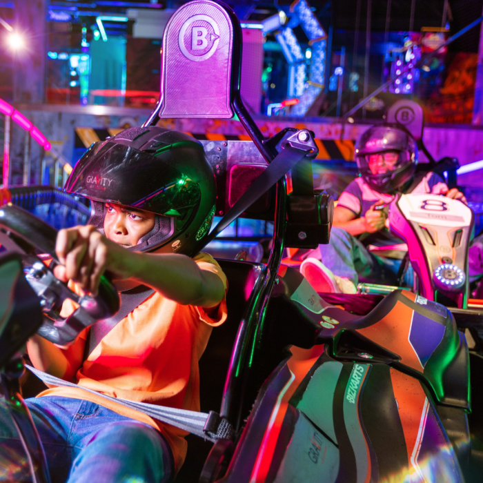 child using arcade racing game