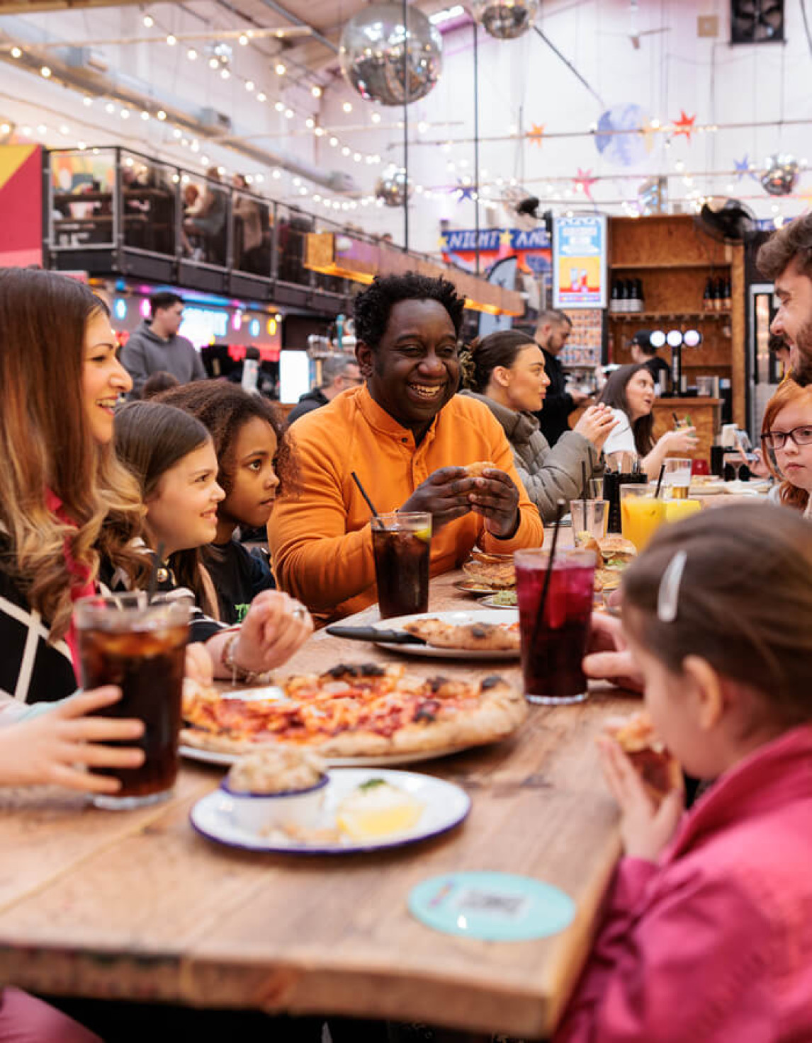 people eating pizza together