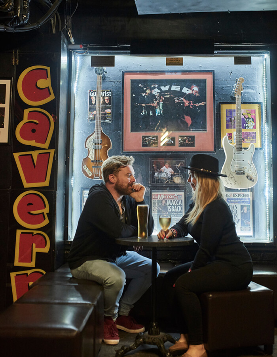 two people sat outside the cavern club