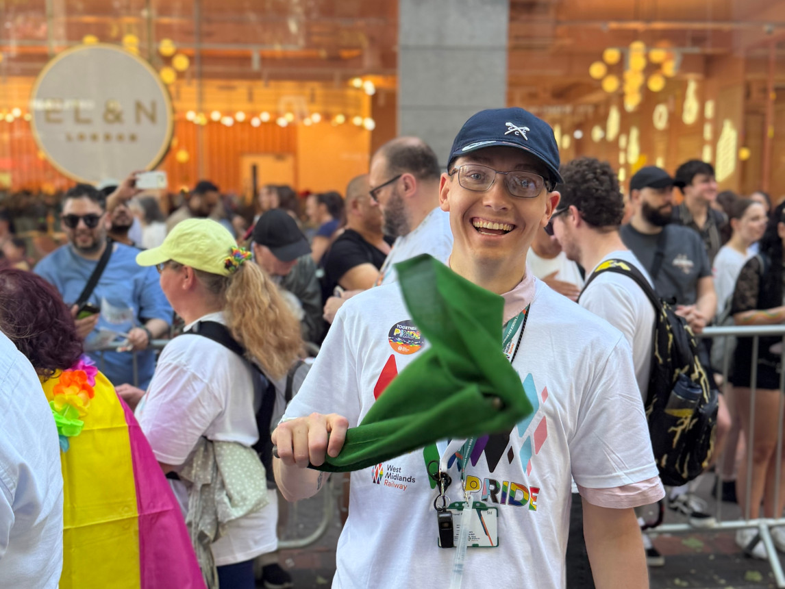 An image of colleagues celebrating Pride