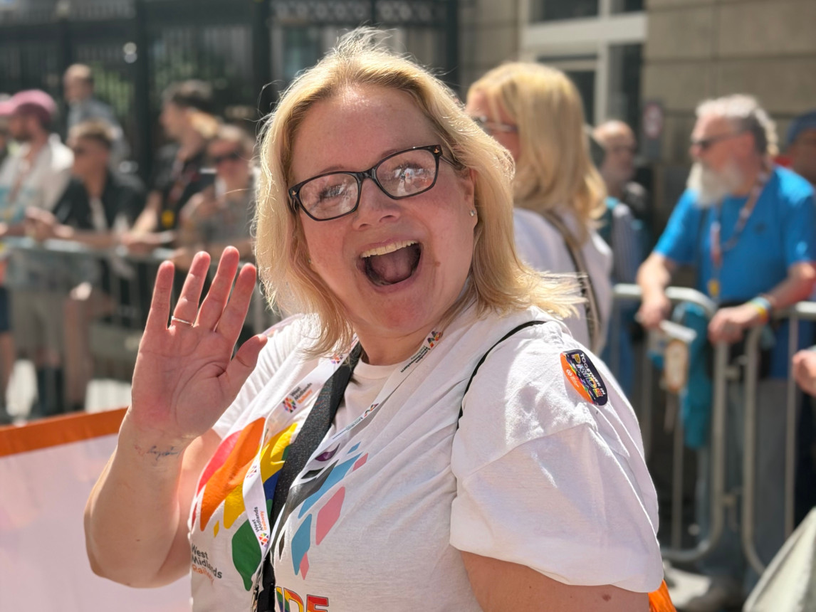 An image of colleagues celebrating Pride