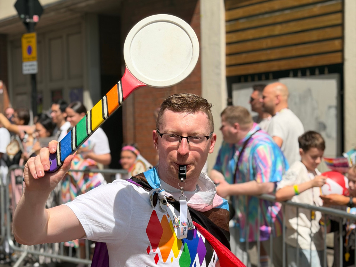An image of colleagues celebrating Pride