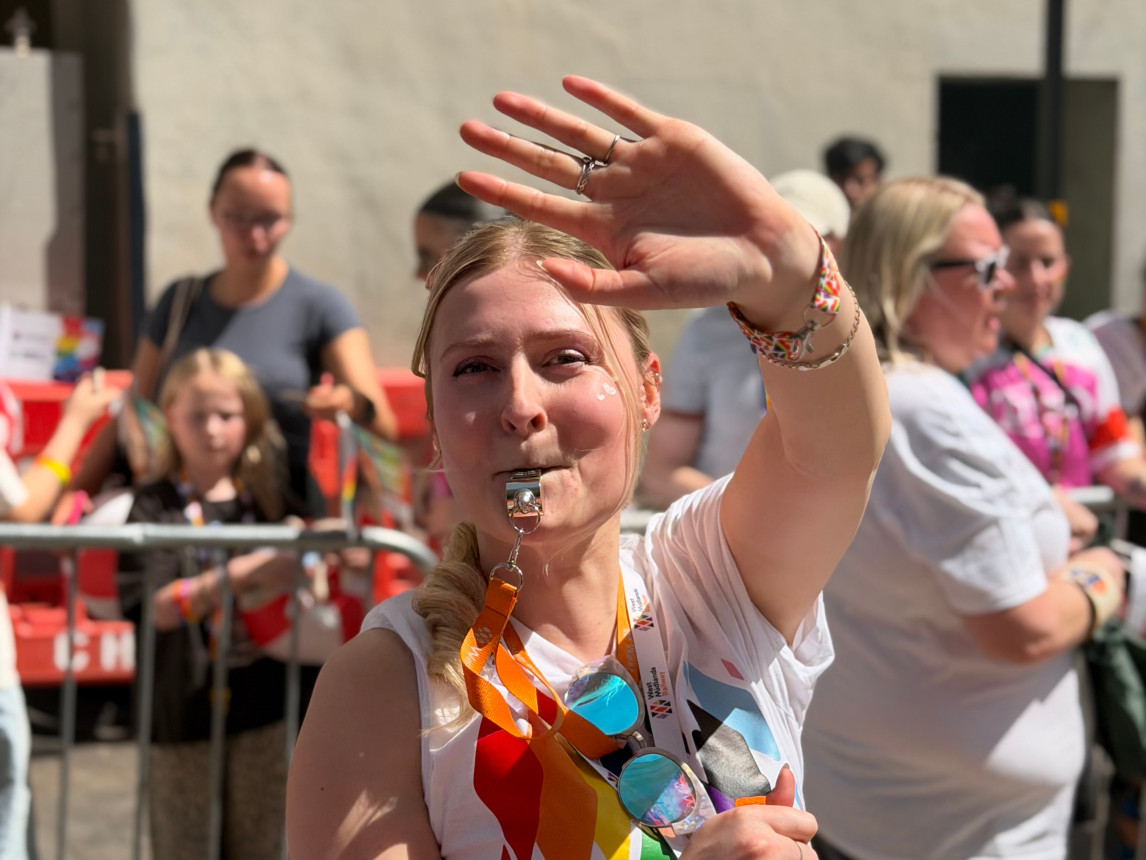 An image of colleagues celebrating Pride
